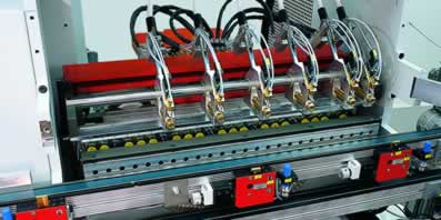 Through-feed machine for drilling, gluing and dowling for double sided operation - GANNOMAT Spectrum - Features and Benefits